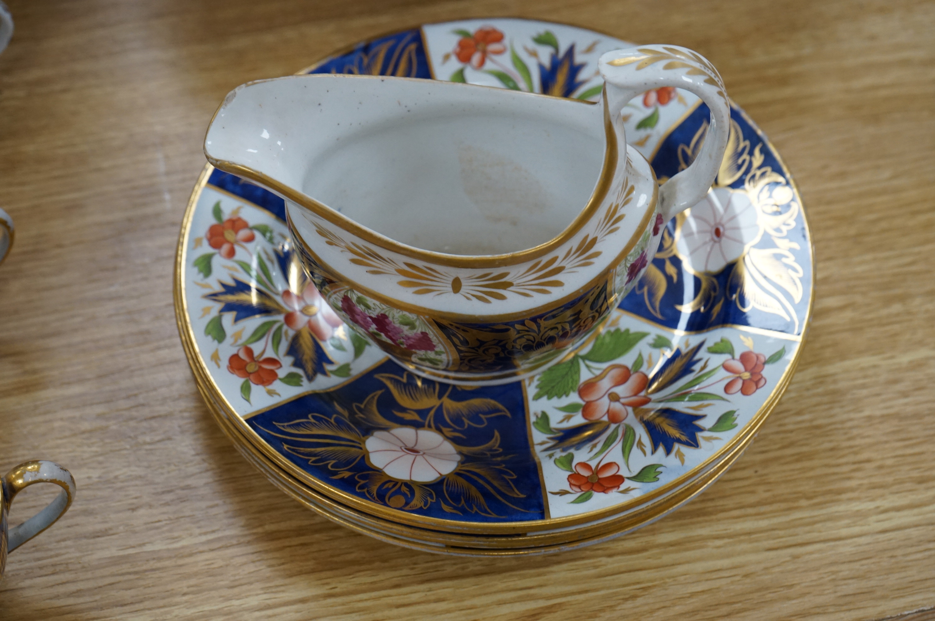 A Wedgwood Queensware Imari part tea set and a Masons Imari pattern bowl, bowl 25.5cm diameter. Condition - some wear to gilt decoration and crazing to interior of jug